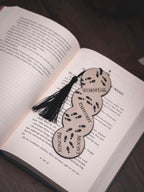 Lesezeichen Rumtreiber mit Quaste | schwarz, iridiumgold metallic